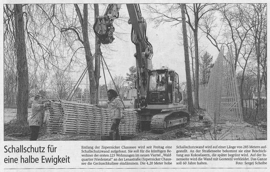 Black-and-white-newspaper-cutout-about-the-building-of-a-natural-soundproof-wall